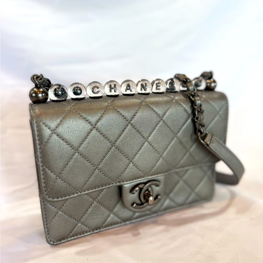 OMG! Authentic Silver Chanel WOC with limited edition acrylic beads! Must SEEEEE